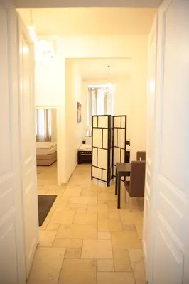 Ein Bett oder Betten in einem Zimmer der Unterkunft Heart of Vienna - City Apartment