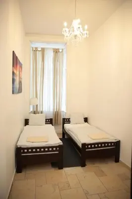 Ein Bett oder Betten in einem Zimmer der Unterkunft Heart of Vienna - City Apartment