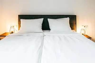 Ein Bett oder Betten in einem Zimmer der Unterkunft Love Suite