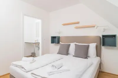 Ein Bett oder Betten in einem Zimmer der Unterkunft Micro Rooftop Penzing