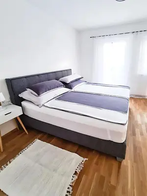 Ein Bett oder Betten in einem Zimmer der Unterkunft Relax Suite