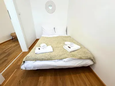 Ein Bett oder Betten in einem Zimmer der Unterkunft Lake View Suite