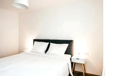 Ein Bett oder Betten in einem Zimmer der Unterkunft Family Suite