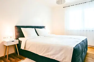 Ein Bett oder Betten in einem Zimmer der Unterkunft Family Suite