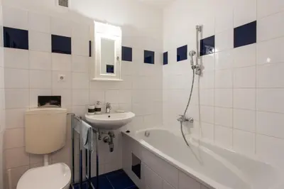 Ein Badezimmer in der Unterkunft VLA - Burggasse