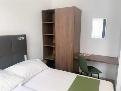 Ein Bett oder Betten in einem Zimmer der Unterkunft Apartment Philip Vienna Self Check-In