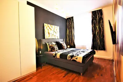 Ein Bett oder Betten in einem Zimmer der Unterkunft Boutique Apartments Vienna - Luxury 2
