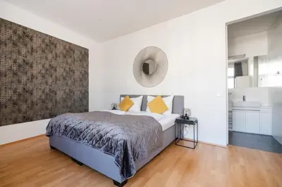 Ein Bett oder Betten in einem Zimmer der Unterkunft Belle Vienna Stay
