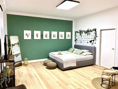 Ein Bett oder Betten in einem Zimmer der Unterkunft Design Apartment Vienna