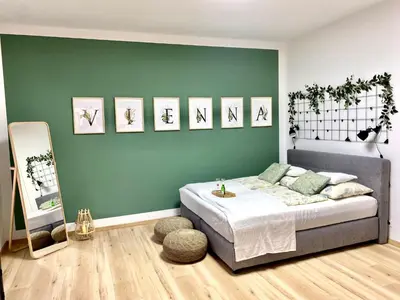 Ein Bett oder Betten in einem Zimmer der Unterkunft Design Apartment Vienna