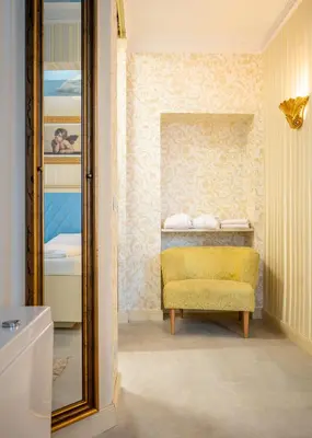 Ein Bett oder Betten in einem Zimmer der Unterkunft Hotel Urania