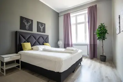 Ein Bett oder Betten in einem Zimmer der Unterkunft Brand new renovated appartment near Augarten