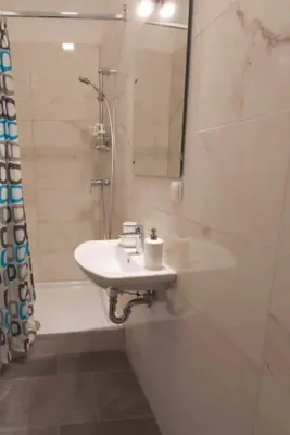 Ein Badezimmer in der Unterkunft Cozy new apartment near Hannovermarkt