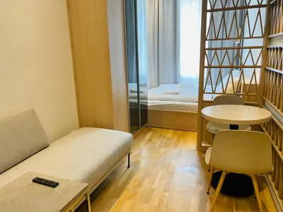 Ein Bett oder Betten in einem Zimmer der Unterkunft ZEUS DESIGN Compact City Aparmtent