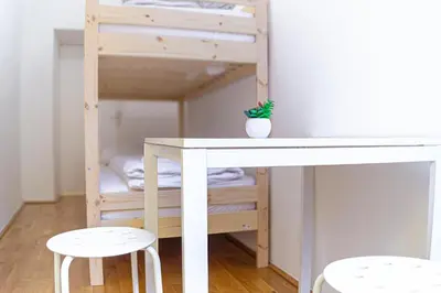Ein Bett oder Betten in einem Zimmer der Unterkunft Comfortable 3BR Next to Belvedere, Ideal for short Stays