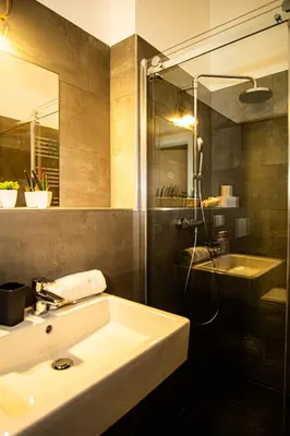 Ein Badezimmer in der Unterkunft Raimond Apartment