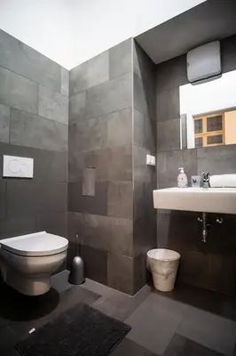 Ein Badezimmer in der Unterkunft Raimond Apartment
