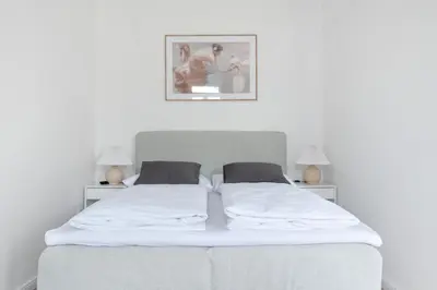 Ein Bett oder Betten in einem Zimmer der Unterkunft Sophienne Apartments