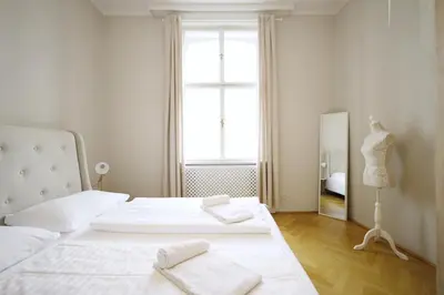 Ein Bett oder Betten in einem Zimmer der Unterkunft HeyMi Apartments Karlsplatz