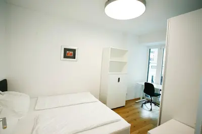 Ein Bett oder Betten in einem Zimmer der Unterkunft Top Central Apartment on Karlsplatz Vienna
