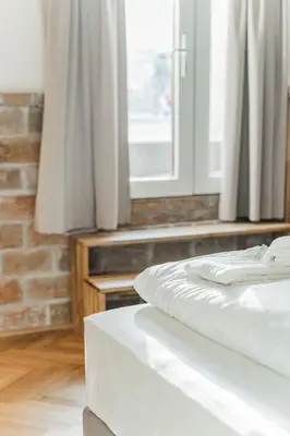 Ein Bett oder Betten in einem Zimmer der Unterkunft easy-flat Severingasse - Stylish 73sqm Apartment near Park and Tram