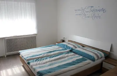 Ein Bett oder Betten in einem Zimmer der Unterkunft Appartement Michelle