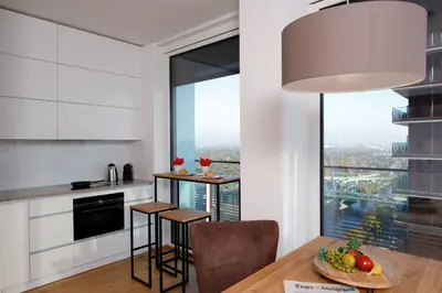 Küche/Küchenzeile in der Unterkunft Triiiple Suites Level 21 mit Balkon und Tiefgarage