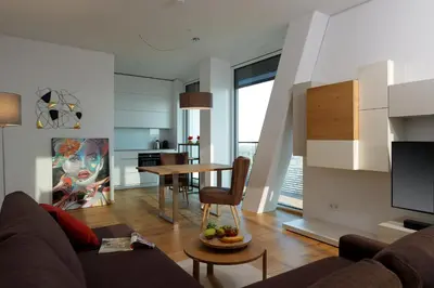 Ein Sitzbereich in der Unterkunft Triiiple Suites Level 21 mit Balkon und Tiefgarage
