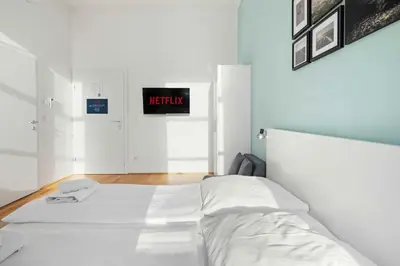 Ein Bett oder Betten in einem Zimmer der Unterkunft 522 Mbit WIFI Self Check In Air Cond