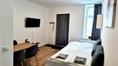 Ein Bett oder Betten in einem Zimmer der Unterkunft Bacher Apartment