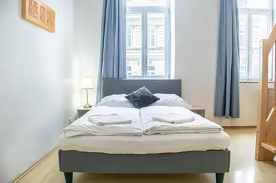 Ein Bett oder Betten in einem Zimmer der Unterkunft Attractive Apartment near Wiener Stadthalle