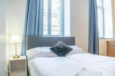 Ein Bett oder Betten in einem Zimmer der Unterkunft Attractive Apartment near Wiener Stadthalle