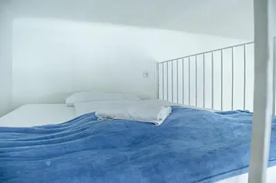 Ein Bett oder Betten in einem Zimmer der Unterkunft Attractive Apartment near Wiener Stadthalle