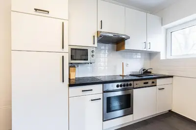 Küche/Küchenzeile in der Unterkunft Experience Central Vienna from a Stylish and Modern Apartment