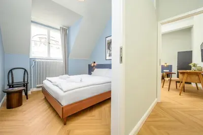 Ein Bett oder Betten in einem Zimmer der Unterkunft Palais Palffy Suits