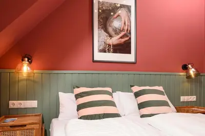 Ein Bett oder Betten in einem Zimmer der Unterkunft Palais Palffy Suits