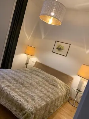 Ein Bett oder Betten in einem Zimmer der Unterkunft Villa Pazelt Top3