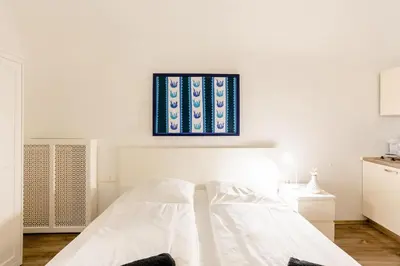 Ein Bett oder Betten in einem Zimmer der Unterkunft Air Condition I all sights in walking distance I 201 Mbit Wifi