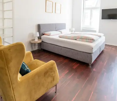 Ein Bett oder Betten in einem Zimmer der Unterkunft Comfortable Apartments Vienna 1100 with contactless Check-in
