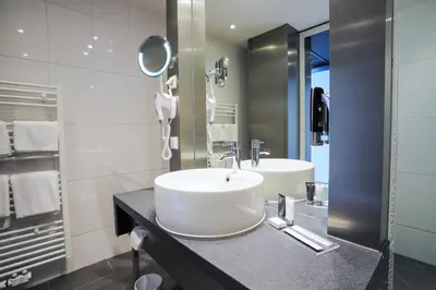 Ein Badezimmer in der Unterkunft Pannonia Tower