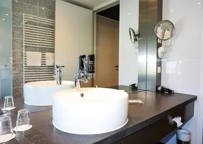 Ein Badezimmer in der Unterkunft Pannonia Tower