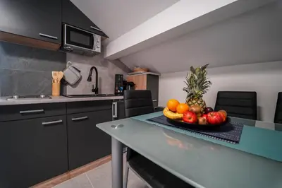 Küche/Küchenzeile in der Unterkunft Ferienhaus in Niederösterreich mit 3 Apartments mitten im Wald