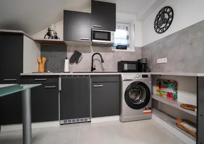 Küche/Küchenzeile in der Unterkunft Ferienhaus in Niederösterreich mit 3 Apartments mitten im Wald