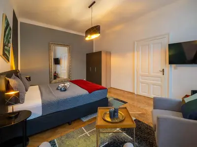 Ein Bett oder Betten in einem Zimmer der Unterkunft Classy Studio Naschmarkt