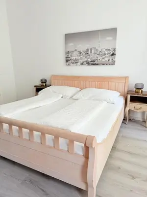 Ein Bett oder Betten in einem Zimmer der Unterkunft Gesamte Unterkunft für 4 Personen Top 3