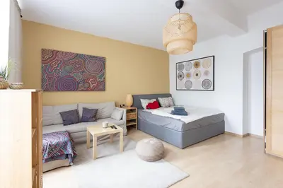 Ein Bett oder Betten in einem Zimmer der Unterkunft NEW ShalalaLiving Vienna - Lovely Family Home near Schönbrunn KG14