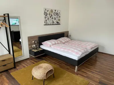 Ein Bett oder Betten in einem Zimmer der Unterkunft Gesamte Unterkunft in Zentrumsnähe