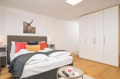 Ein Bett oder Betten in einem Zimmer der Unterkunft Cozy Favoriten