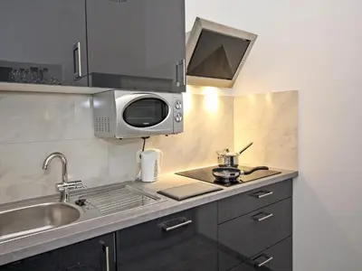 Küche/Küchenzeile in der Unterkunft Ferienwohnung Klimt