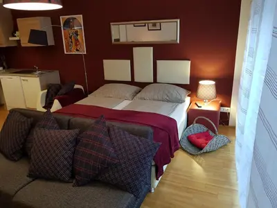 Ein Bett oder Betten in einem Zimmer der Unterkunft BullsLiving Kaisermühlen Apartment Erni next to UNO City